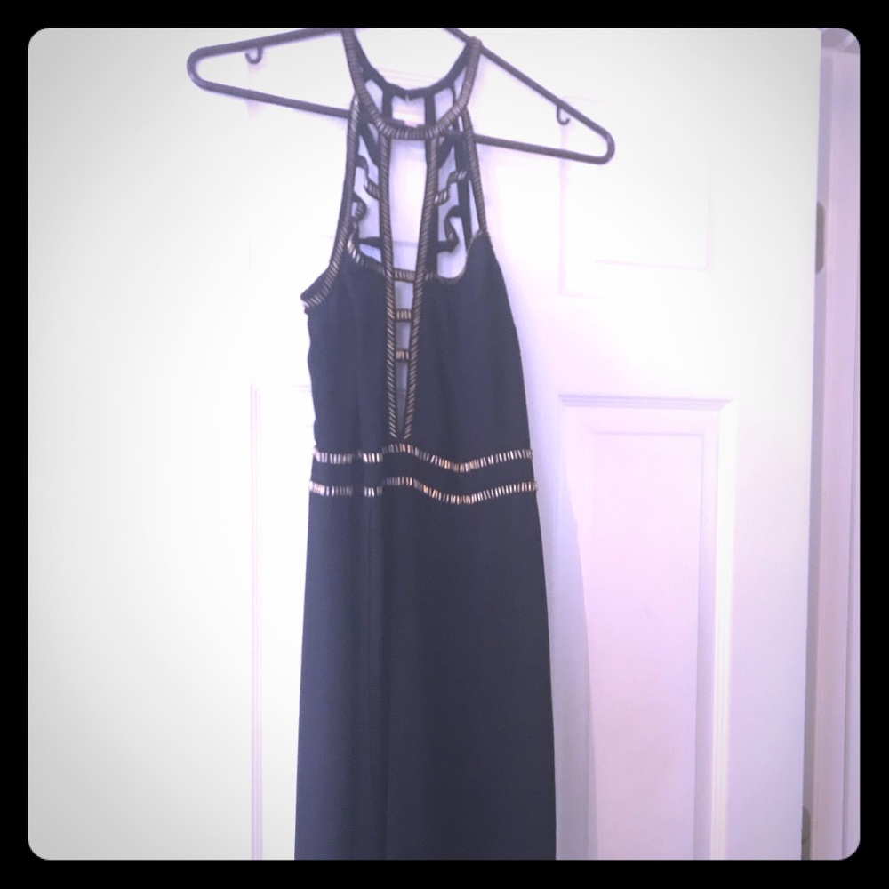 Beautiful black romper w/ gold beading.